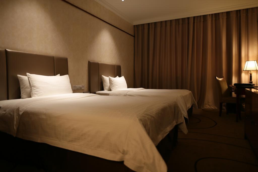 Yashidu Suites Hotel Shanghai Chambre photo